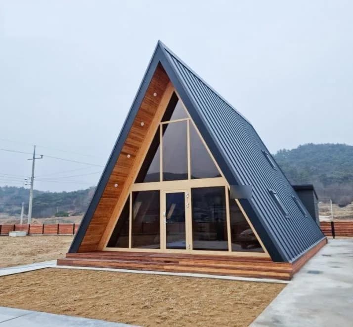 KyangLab Tiny Villa A2 — completed A-frame home, front view