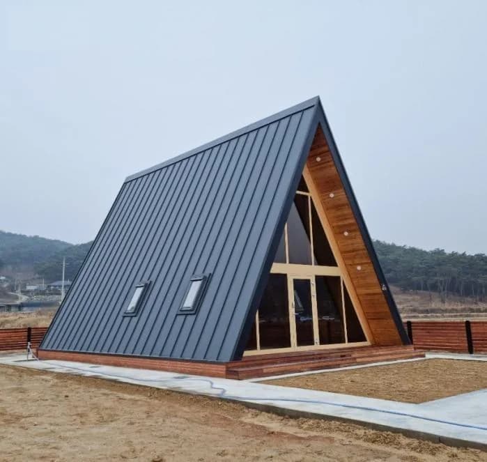 KyangLab Tiny Villa A2 — standing-seam metal roof, side view